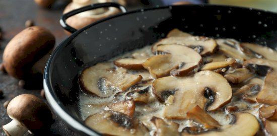 concept-tasty-food-with-mushroom-sauce-dark-textured-background
