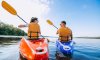 couple-together-kayaking-on-the-river-compressed
