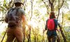 couple-trekking-together-compressed